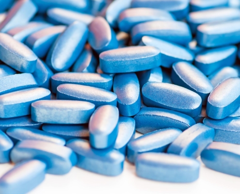 Close up view of blue-coated tablets